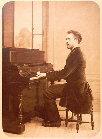 Portrait of Benjamin Godard playing the piano