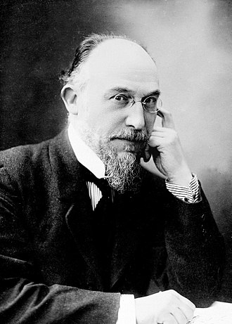 Black and white photo of Eric Satie in his later years