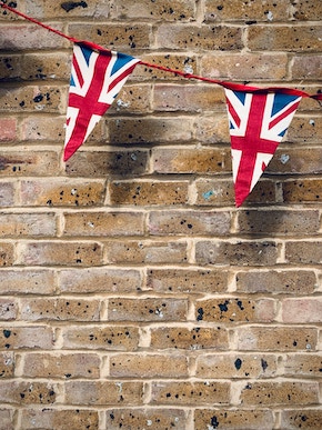 Union flag bunting against a wall